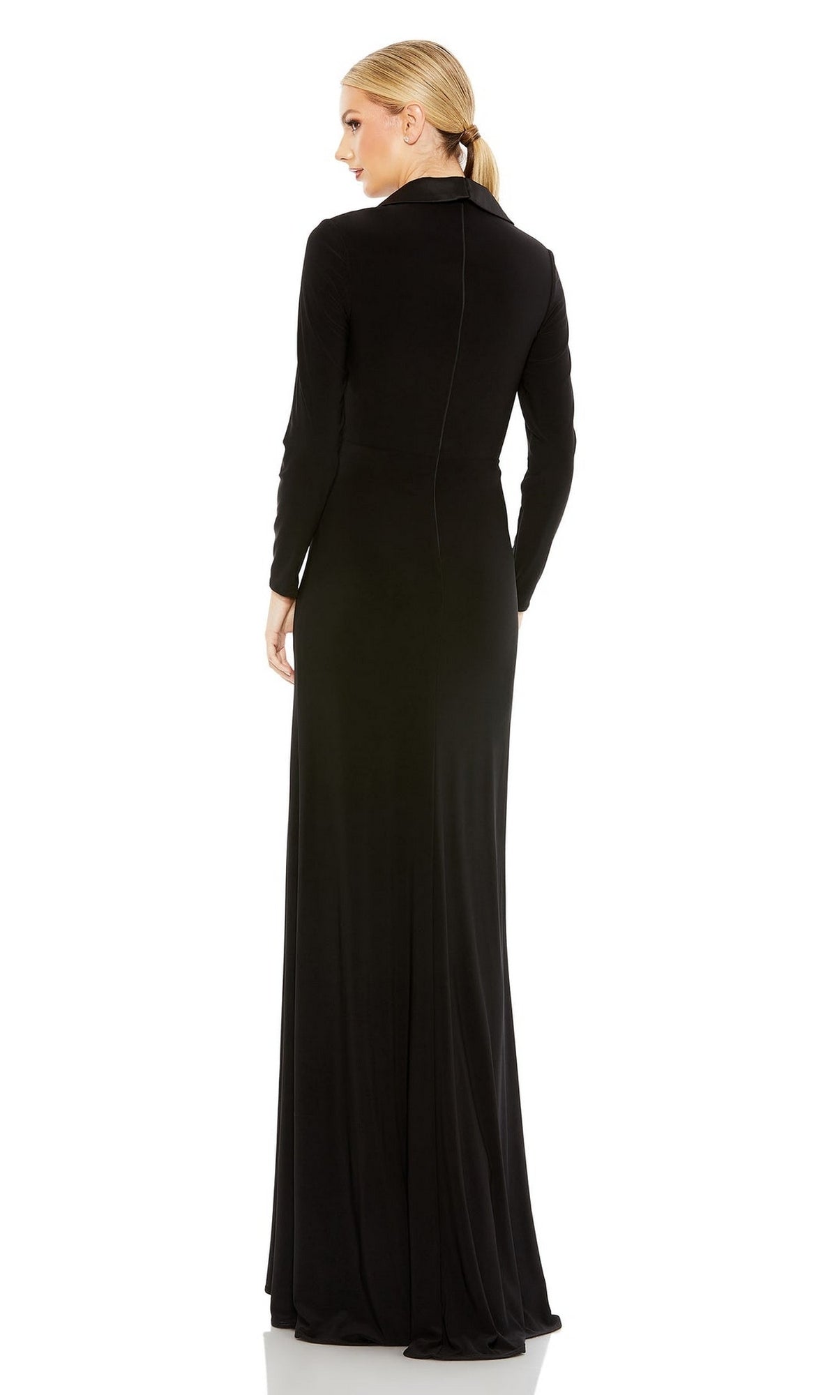 A woman with blonde hair in a low ponytail faces away, wearing the Long Formal Dress 26731 by Mac Duggal—a black, collared, floor-length gown with long sleeves.